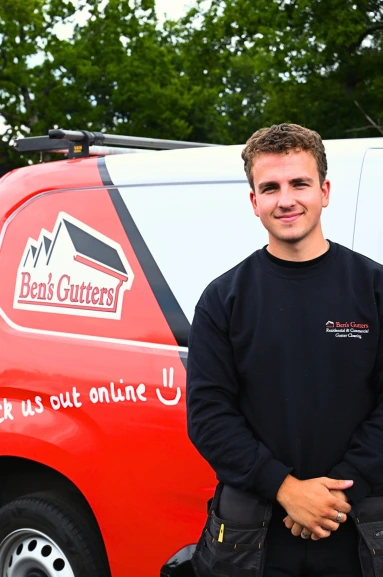 our gutter cleaner in Hereford standing by company vehicle